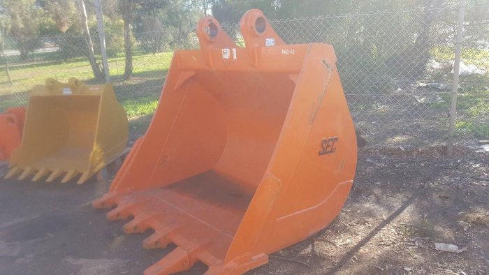Assorted New and Used Buckets, Grabs, Quick Hitches, Demolition Attachments, Log Grab, Etc.