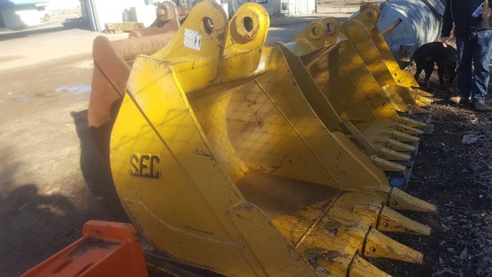 Assorted New and Used Buckets, Grabs, Quick Hitches, Demolition Attachments, Log Grab, Etc.