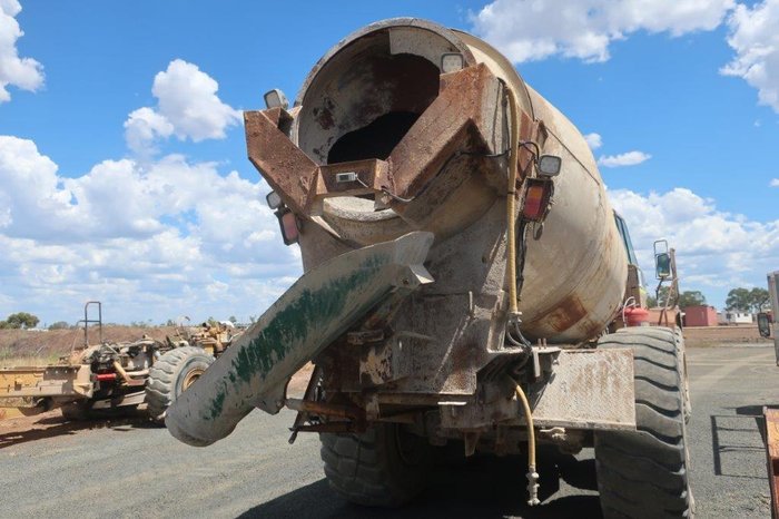 2004 Caterpillar 730 Agitator YELLOW