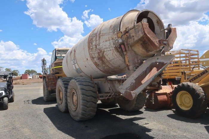 2004 Caterpillar 730 Agitator YELLOW