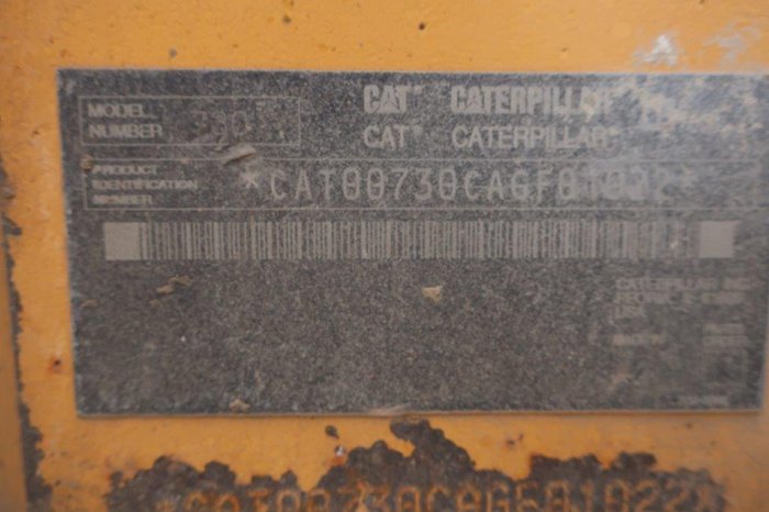 2004 Caterpillar 730 Agitator YELLOW