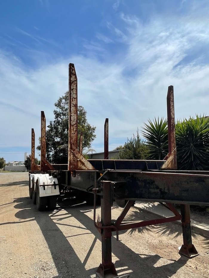 1981 CUSTOM BUILT 12M Tri/A Log Trailer