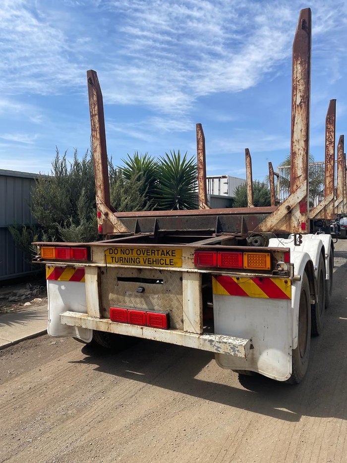 1981 CUSTOM BUILT 12M Tri/A Log Trailer