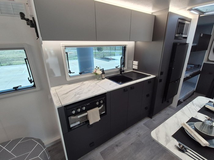 2025 New Age Caravans 21' Road Owl Expedition Family Bunk