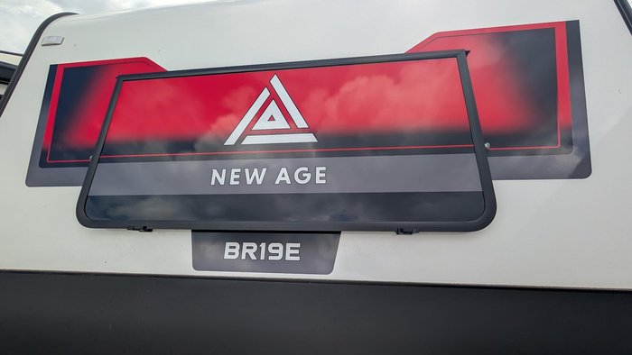 2025 New Age Caravans 19' Big Red Slide Out Save $11,099 Was $110,990