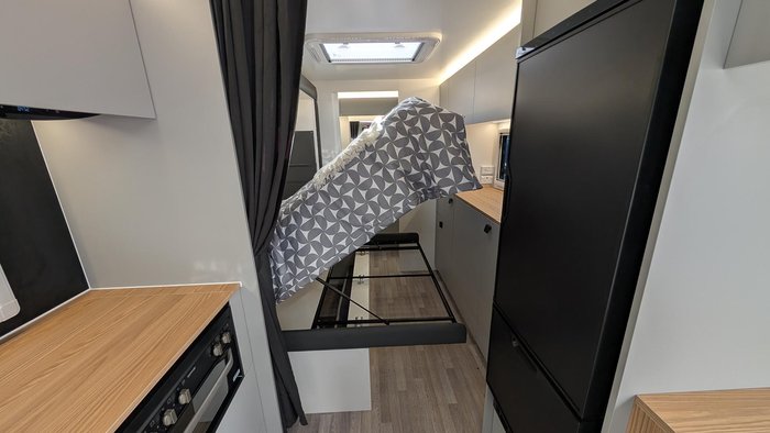 2025 New Age Caravans 19' Big Red Slide Out Save $11,099 Was $110,990