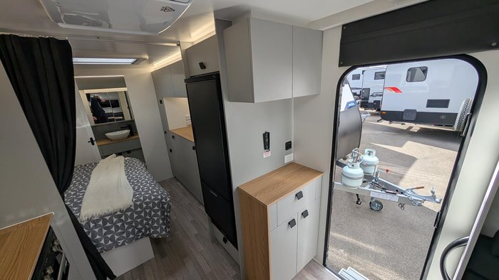 2025 New Age Caravans 19' Big Red Slide Out Save $11,099 Was $110,990