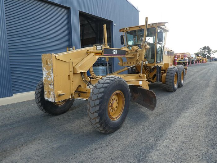 1999 Caterpillar 12H YELLOW