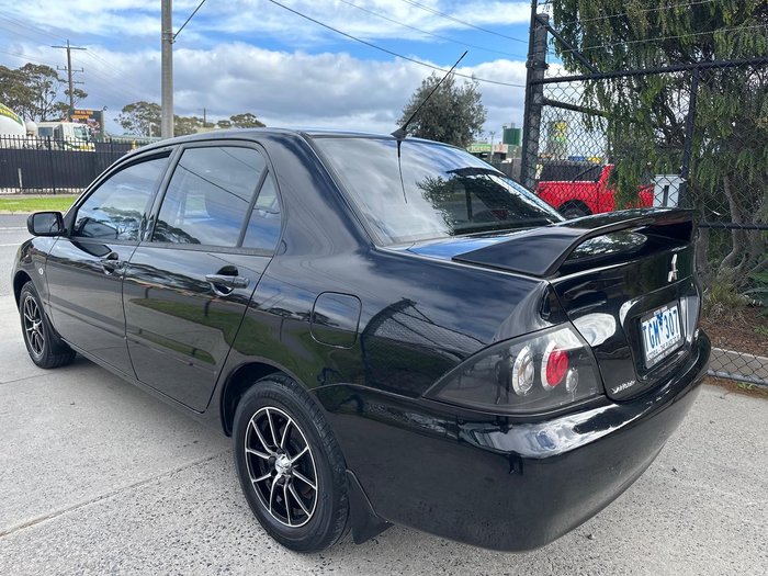 2004 Mitsubishi Lancer ES CH MY05 Black Mica
