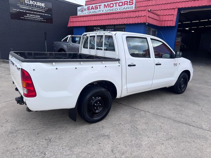 2009 Toyota Hilux SR GGN15R MY09 4x2 Glacier White