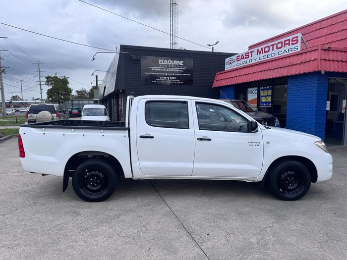 2009 Toyota Hilux SR GGN15R MY09 4x2 Glacier White
