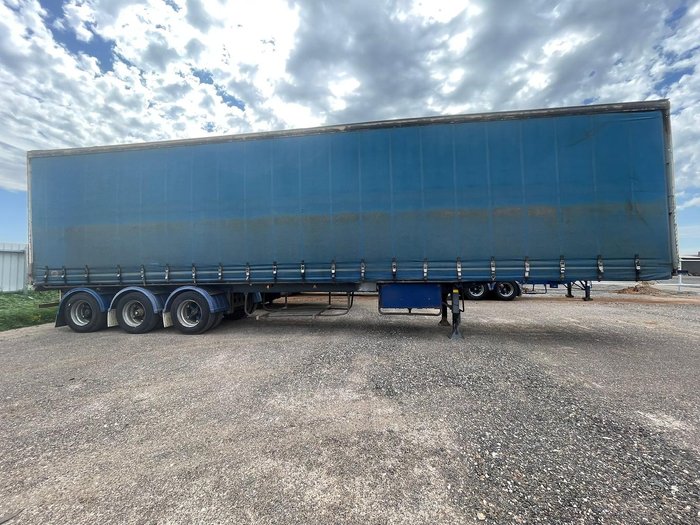 1989 Maxicube Curtainsider Tri-Axle Trailer