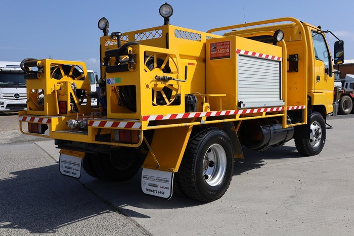 2003 Isuzu N Series NPS 300 Fire Truck Yellow