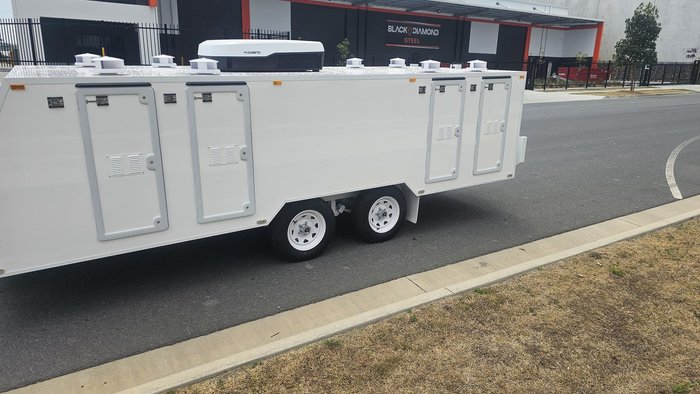 2025 McNeill 8 Berth Dog Trailer
