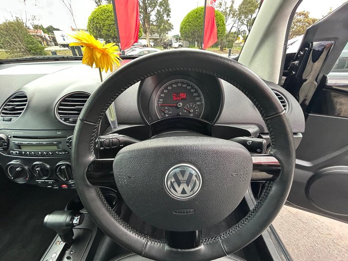 2010 Volkswagen Beetle BlackOrange 1Y MY10 Black