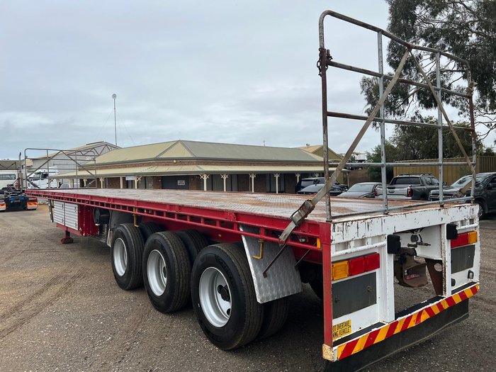 2012 CIMC Tri Axle Flat Top