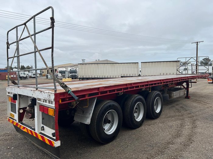 2012 CIMC Tri Axle Flat Top