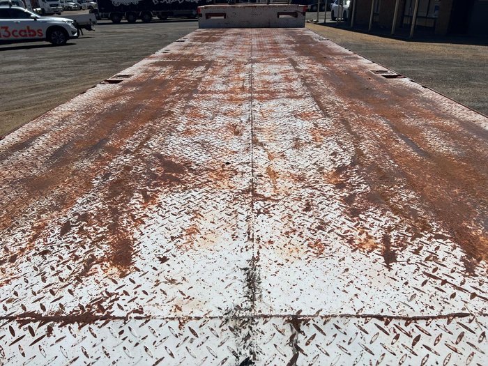 Howard Porter Tri Axle Drop Deck With Bi-Fold Ramps