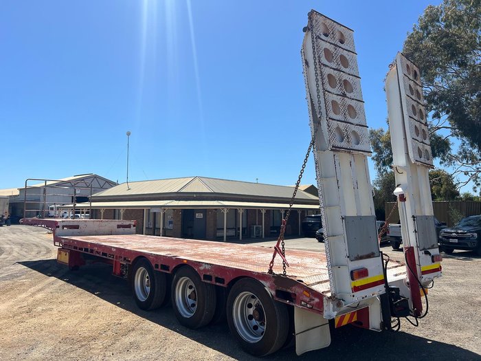 Howard Porter Tri Axle Drop Deck With Bi-Fold Ramps