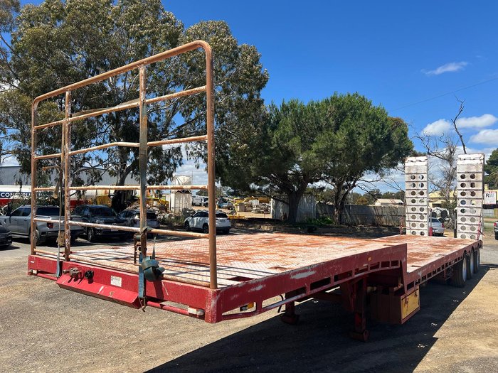 Howard Porter Tri Axle Drop Deck With Bi-Fold Ramps