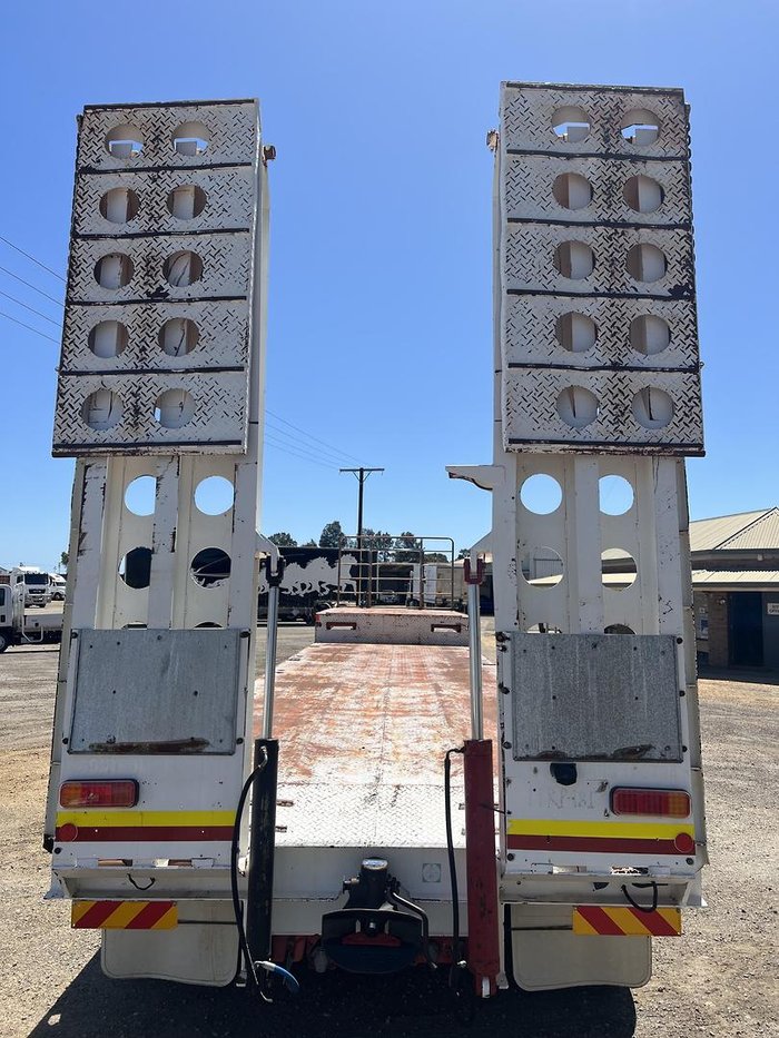 Howard Porter Tri Axle Drop Deck With Bi-Fold Ramps