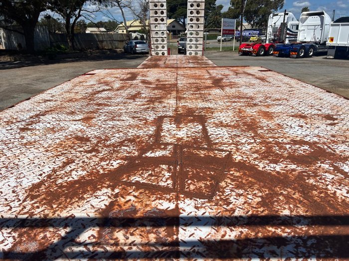 Howard Porter Tri Axle Drop Deck With Bi-Fold Ramps