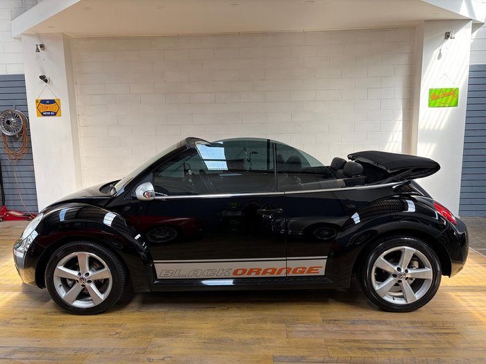 2010 Volkswagen Beetle BlackOrange 1Y MY10 Black
