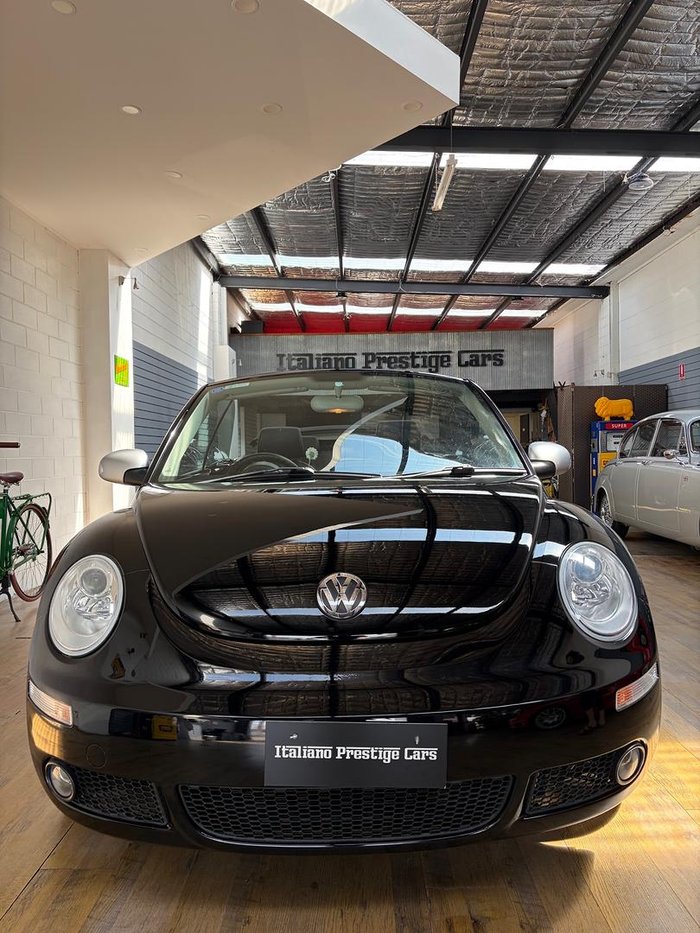 2010 Volkswagen Beetle BlackOrange 1Y MY10 Black