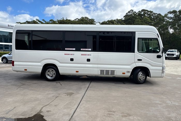 2023 Toyota Coaster GDB70R French Vanilla