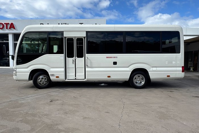 2023 Toyota Coaster GDB70R French Vanilla