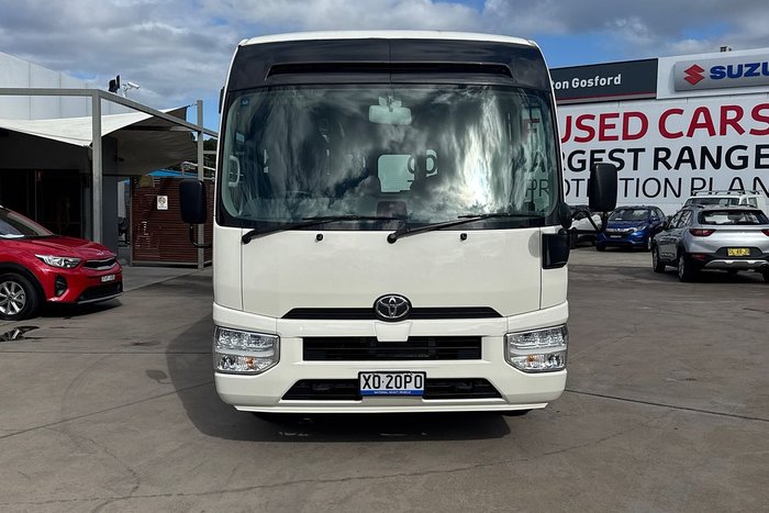 2023 Toyota Coaster GDB70R French Vanilla