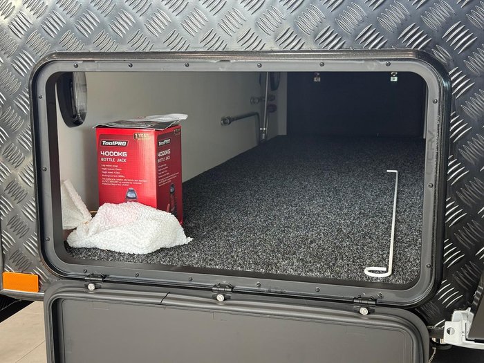 2026 JB Caravans Dirt Road Xtreme 23'6 Corner Shower Club Lounge