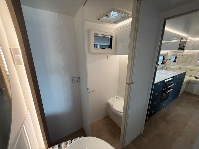 2026 JB Caravans Dirt Road Xtreme 23'6 Corner Shower Club Lounge