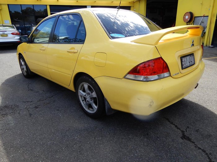2007 Mitsubishi Lancer ES CH MY07 Yellow Solid