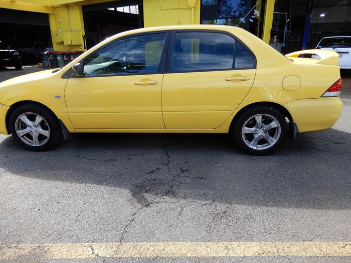 2007 Mitsubishi Lancer ES CH MY07 Yellow Solid