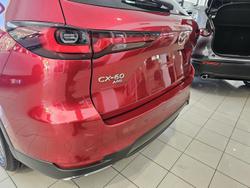 2024 Mazda
                CX-60 G40e Evolve