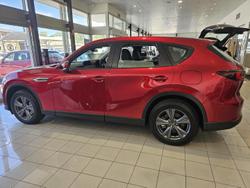2024 Mazda
                CX-60 G40e Evolve