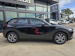 2024 Mazda
                CX-30 G20 Evolve