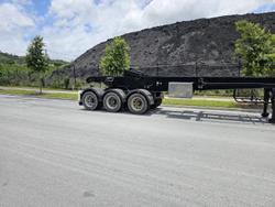 2008 Moore 36 Hooklift Stable Tip Black