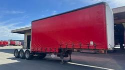 2008 Krueger 12P Drop Deck A Mezzanine Curtain Sider White