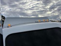 2024 Kenworth T909 White