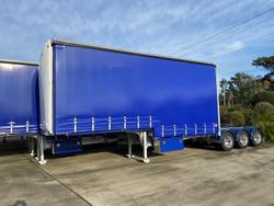 2024 Krueger Drop Deck Mezz A Trailer Curtainsider