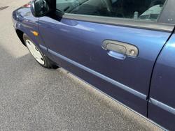 2000 Ford
Laser LXi