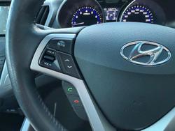 2012 Hyundai
Veloster +