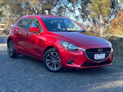 2014 Mazda
                2 Neo