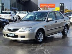 2002 Mazda
323 Protege Shades