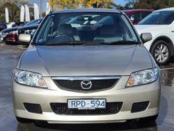 2002 Mazda
323 Protege Shades