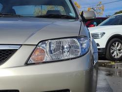 2002 Mazda
323 Protege Shades