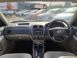 2002 Mazda
323 Protege Shades