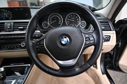 2014 BMW
                3 Series 316i